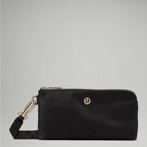 lululemon athletica Black and Gold Wristlet